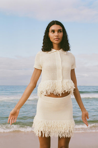 GILET EN MAILLE QUADRILLÉ À FRANGES