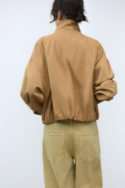 VESTE À FAIBLE VOLUME